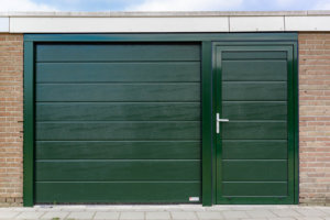 Woodgrain sectionaaldeur met loopdeur | Brabant Deur